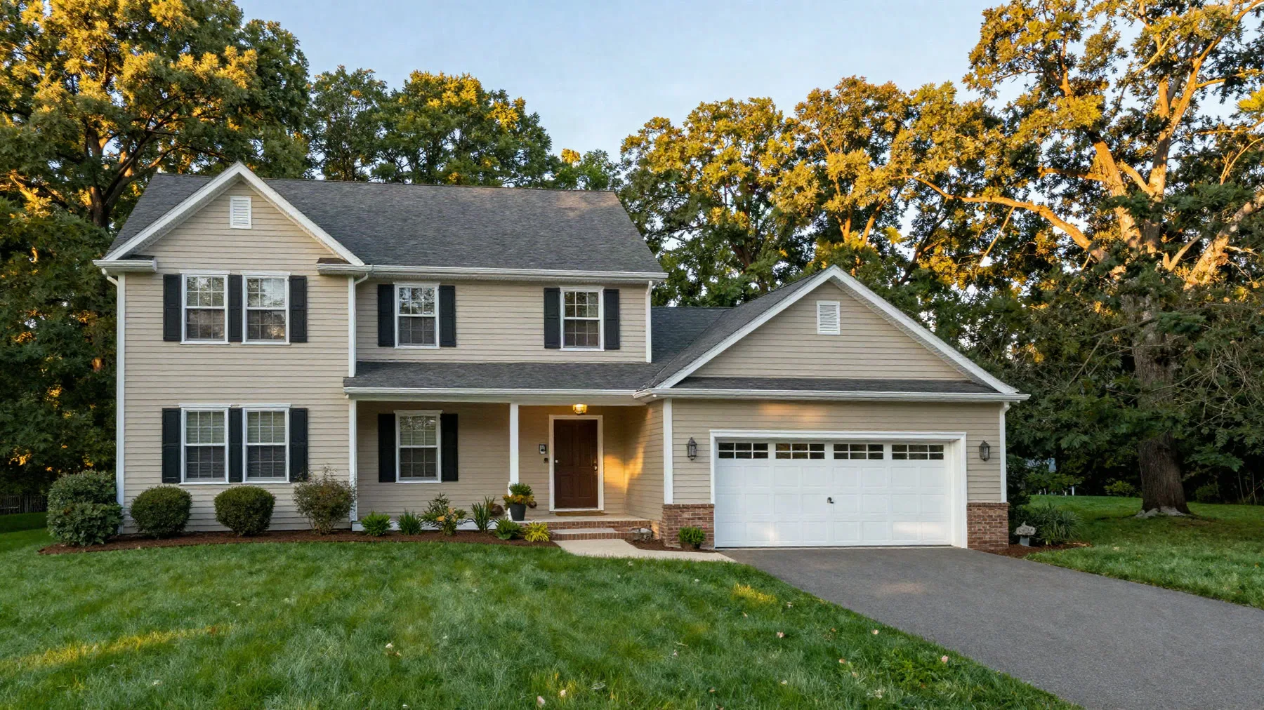 Front exterior of 14 Bramblewood Lane, a four-bedroom colonial in Pittsford, NY